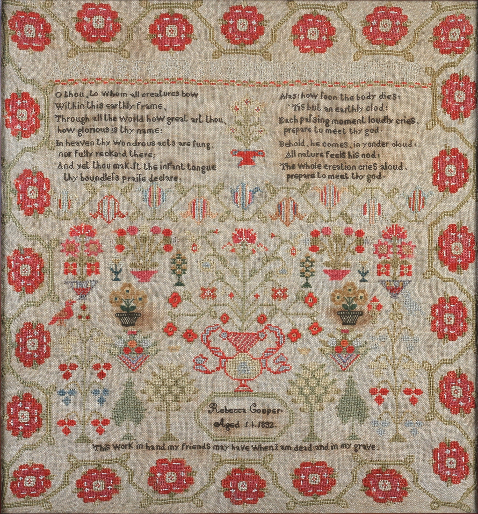 AN EARLY 19TH CENTURY SAMPLER worked by Rebecca Cooper aged 11, 1832, with text, flowering trees and