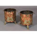 A PAIR OF VICTORIAN TWO HANDLED COPPER CYLINDRICAL COAL BINS, the seamed bodies applied with lion