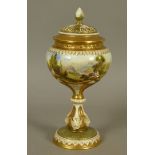 A ROYAL WORCESTER PEDESTAL POT POURRI VASE AND COVER, the fluted body finely painted by Roberts with