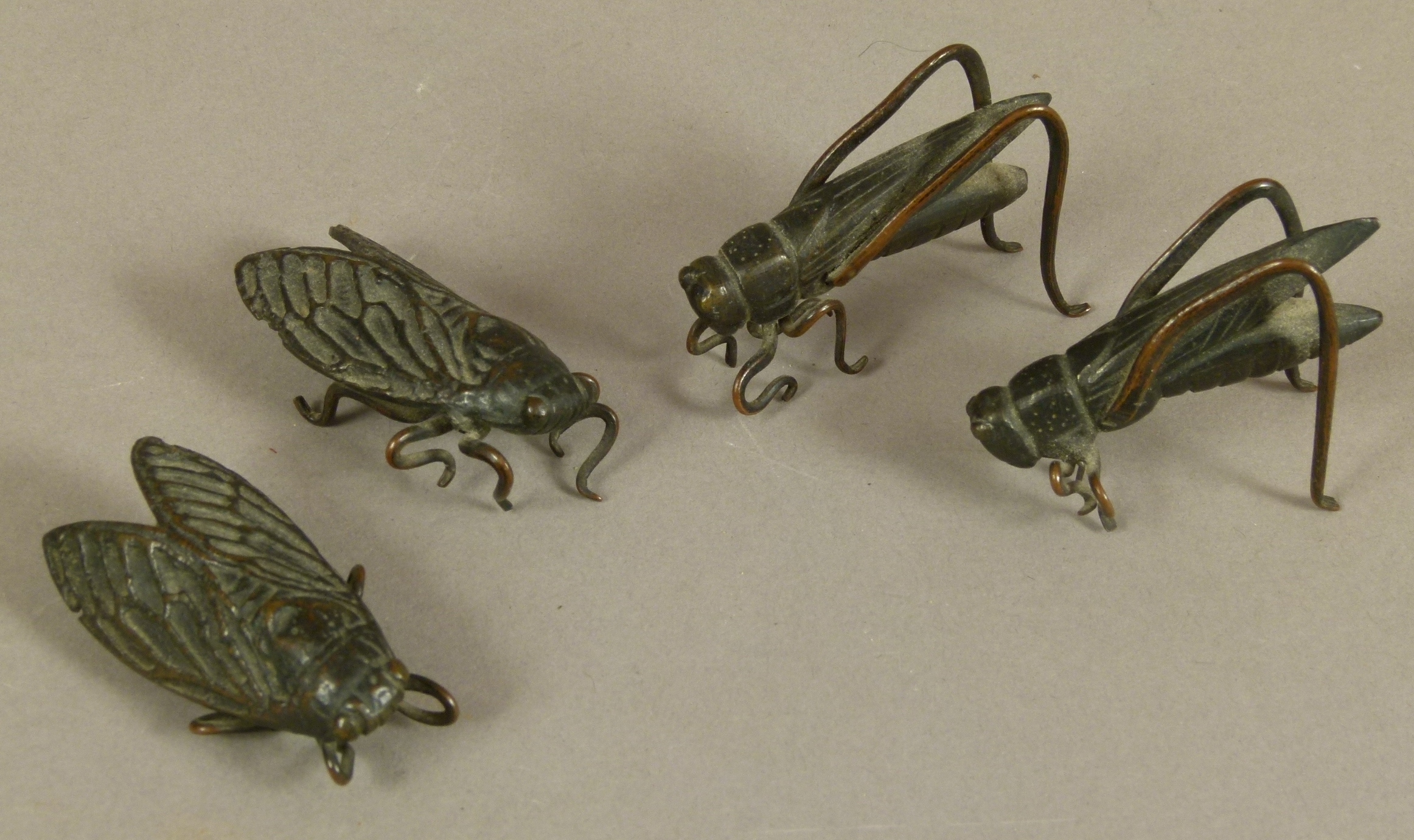 FOUR JAPANESE BRONZE INSECTS, Meiji period including two crickets and two cicadas, 5cm wide and - Image 2 of 2