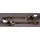 A PAIR OF GEORGE III SILVER FIDDLE PATTERN GRAVY SPOONS engraved with a crest by Thomas Wallis and