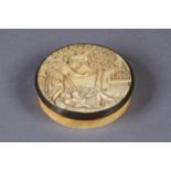 A FRENCH IVORY BOX, circular, late 18th century, the cover carved in bas relief with the death of