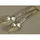 A PAIR OF GEORGE III SILVER TABLE SPOONS, Old English pattern, dog tooth and wrigglework borders,