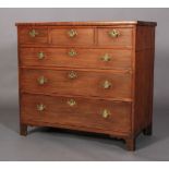 AN EARLY 19TH CENTURY MAHOGANY AND EBONY BANDED CHEST of three long and three graduated drawers,