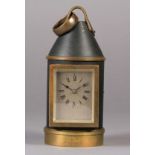 AN INTERESTING 'INDUSTRIAL' CARRIAGE CLOCK OF LANTERN FORM, the black Japanned cylindrical case with