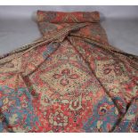 A SURYVNA CARPET, West Anatolia the blue field with overall palmettes, vines and leaves within a