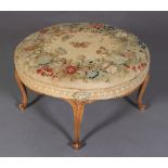 AN EARLY VICTORIAN MAPLE FRAMED CIRCULAR STOOL, the stuffed over top worked in gros and petit