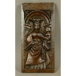 A 16TH CENTURY OAK FIGURAL PANEL the arched frame carved with a crowned female holding an infant,