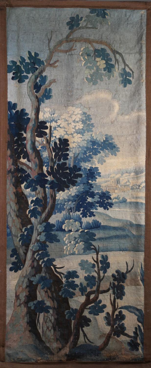 A FLEMISH VERDURE TAPESTRY FRAGMENT, early 18th century, woven with an oak sapling to the foreground