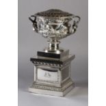 A SILVER PLATED REPLICA OF THE WARWICK VASE c.1900, inset with gilt metal low domed grill, and