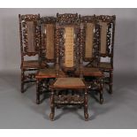 A SET OF SIX CHARLES II STYLE WALNUT SIDE CHAIRS, 19th century pierced and foliate carved cresting