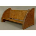 A THOMPSON OF KILBURN 'MOUSEMAN' BOOK TROUGH, carved in relief with a mouse, 46cm wide. See