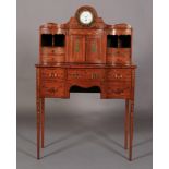 AN EDWARD VII PAINTED SATINWOOD BONHEUR DU JOUR, the superstructure with white enamel dial clock