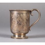 A MID VICTORIAN SILVER CHRISTENING MUG London 1870, having a beaded rim and foot, engraved with