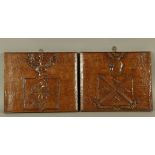 A PAIR OF 19TH CENTURY OAK ARMORIAL carved rectangular panels each with a filled shield and crest,