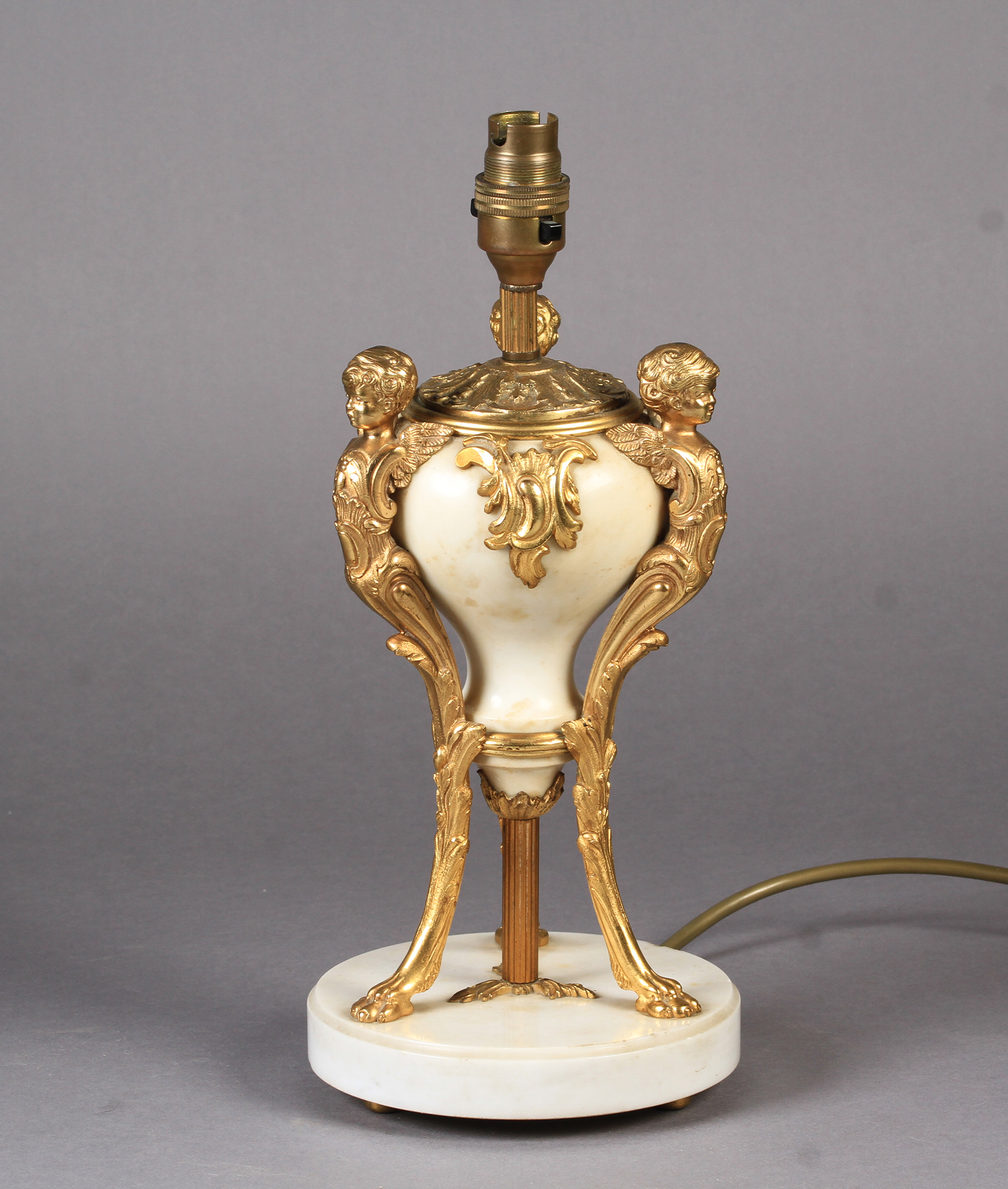 A LATE 19TH CENTURY ORMOLU MOUNTED WHITE MARBLE LAMP BASE with inverted pear shaped body, mounted