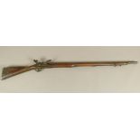 A LATE 18TH CENTURY FLINTLOCK MUSKET three quarter stocked with steel lock plate engraved REA, brass