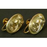 A PAIR OF ART NOUVEAU EARRINGS in 9ct gold each oval face embossed with a female portrait, on