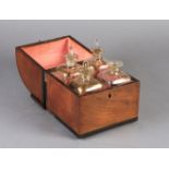 A DUTCH MAHOGANY DECANTER BOX c.1810, having a cylinder hinged lid, the interior fitted with four