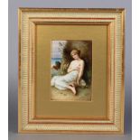 A VIENNA PORCELAIN RECTANGULAR PLAQUE, finely painted with a draped young woman leaning against a