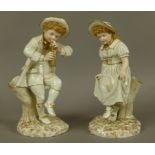 A PAIR OF ROYAL WORCESTER PORCELAIN FIGURES, model 1070, as a young boy playing a recorder and