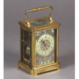 A LATE 19TH CENTURY BRASS CASED HOUR REPEATING CARRIAGE CLOCK the silvered face finely engraved