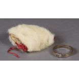 A MID 18TH CENTURY WHITE SQUIRREL FUR MUFF made from a child's pet together with the white metal