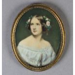 HEAD AND SHOULDER OVAL PORTRAIT OF JENNY LIND, she wears pale pink roses in her hair, indistinctly