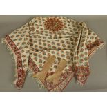 AN EARLY 19TH CENTURY HAND BLOCK PRINTED SHOULDER SHAWL, wool, the ivory ground with all-over repeat