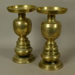 A PAIR OF JAPANESE BRASS THREE SECTION VASES, Meiji period, inlaid in coloured metals with plant