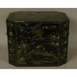A CHINESE LAC-BURGAUTE TEA BOX, c.1820 rectangular with canted corners, the black ground painted and