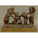 19TH CENTURY FRENCH SCHOOL - Terracotta of four lightly draped and naked infants, one blindfolded,