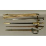 A GROUP OF FOUR SWORDS including a Victorian British Army infantry officer's sword, an early 19th