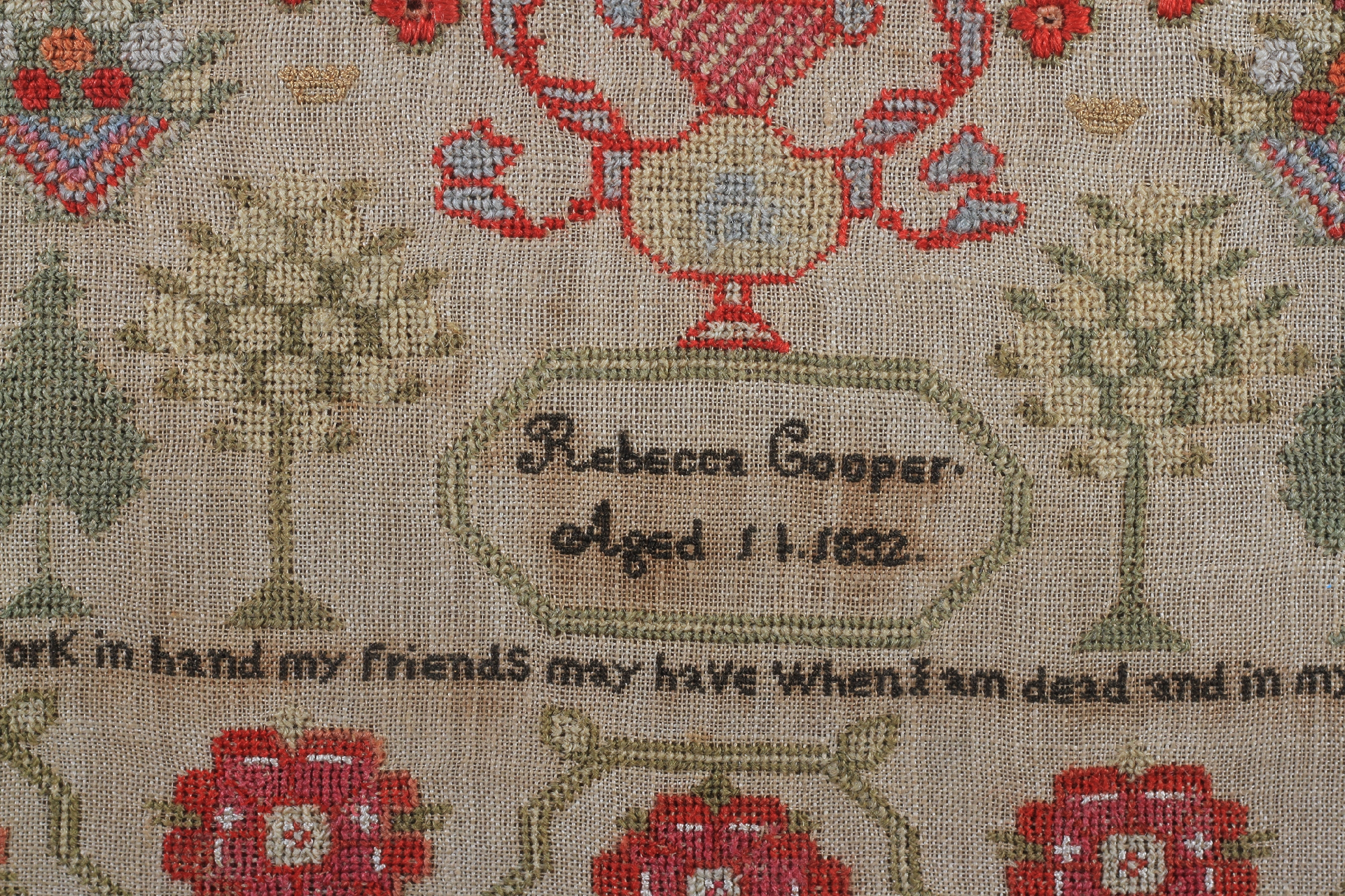 AN EARLY 19TH CENTURY SAMPLER worked by Rebecca Cooper aged 11, 1832, with text, flowering trees and - Image 4 of 4