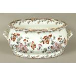A LATE 19TH CENTURY WEDGWOOD POTTERY 'COUNTRY HOUSE' FOOTBATH of conventional two handled form,