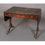 A REGENCY ROSEWOOD VENEERED SOFA TABLE, fitted with pair of drawers and blind opposing, gilt metal