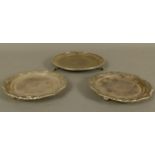 A PAIR OF REGENCY PLATED ON COPPER WAITERS, octagonal with gadroon, shell and foliate rim,