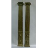 A PAIR OF 17TH CENTURY STYLE OAK FLAT PILLARS with Doric capitals, fluted tapered columns, the bases