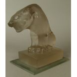 AN ART DECO FROSTED GLASS SCULPTURE OF A LARGE PANTHER, sitting on a rectangular plinth base, 19cm