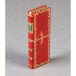 A GEORGE III SLIPCASE MODELLED AS A RED MOROCCAN LEATHER BOOK gilt tooled and titled 'Bath Gift',