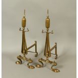 A PAIR OF BRONZE ART NOUVEAU BULL RUSH ANDIRONS, scrolling feet, 48cm high, late 19th century