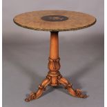 AN EARLY VICTORIAN WALNUT TABLE, the circular segmental veneered top with applied gilt and floral