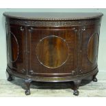 Pratts of Bradford - a reproduction mahogany sideboard in George III style, the semi circle top with