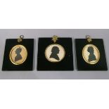 A pair of 19th century silhouettes, one titled verso 'Jane Ewbank 1834', with gilt metal acorn and