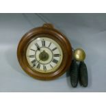 A 19th century postman's clock the moulded mahogany stained pine frame enclosing a white enamel dial