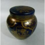 A Booth's ginger jar and cover printed in gilt on blue in the chinoiserie manner with urns of