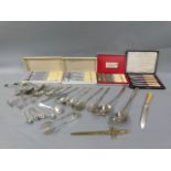A quantity of table cutlery, boxed, cased and loose, together with a pair of knife rests etc