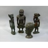 A Makonde Shitini figure, the figure carved and base labeled Mombasa July 1969; together with