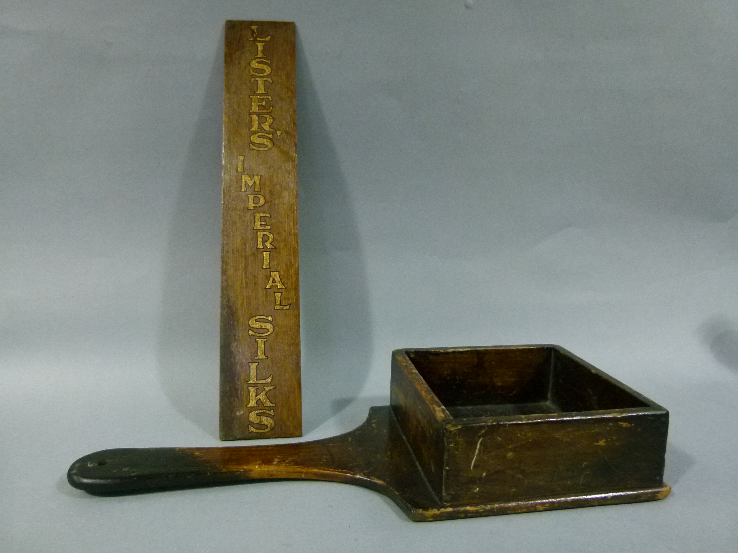 A collection box on flattened waisted handle together with a Lister's Imperials Silks advertising