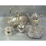A quantity of silver plated ware including, three piece tea service, Guernsey creamer, egg frame and